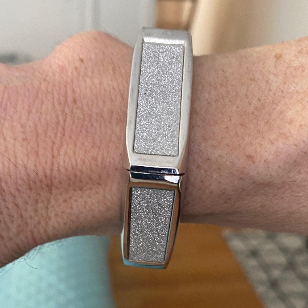 Source Unknown Silver and rhinestone spring bangle